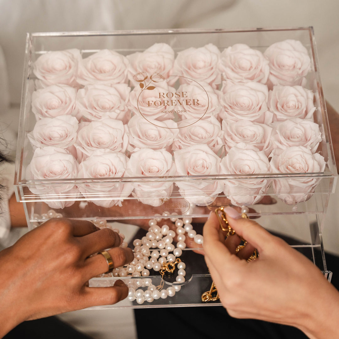 24 pink roses in a crystal clear box with drawer